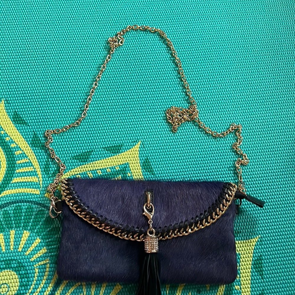 New never used purple and black genuine leather fur clutch with detachable chain